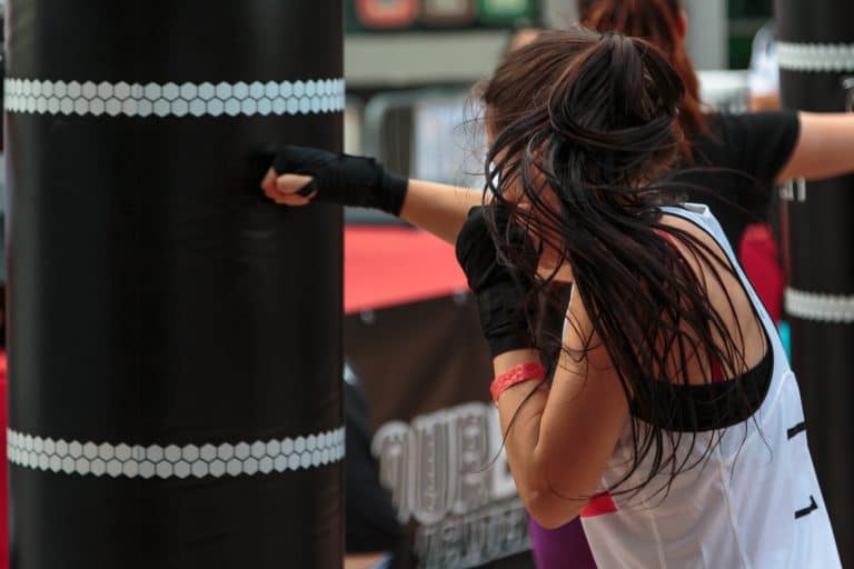 Young Girl with Shorts and White Tank Top: Fitness Boxing Workou