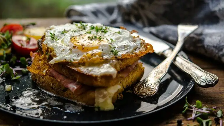 sunny side-up egg and bread on plate